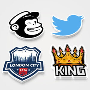 Various shapes and sizes of custom die cut stickers displayed in a professional setting.