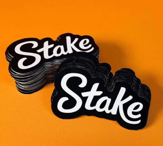 A close-up of personalized die cut stickers featuring a glossy finish.