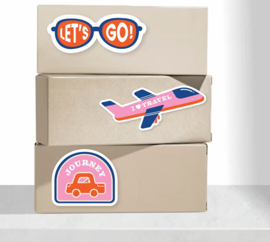 Custom vinyl sticker sheets showcasing brand logos and artwork printed by Print Station